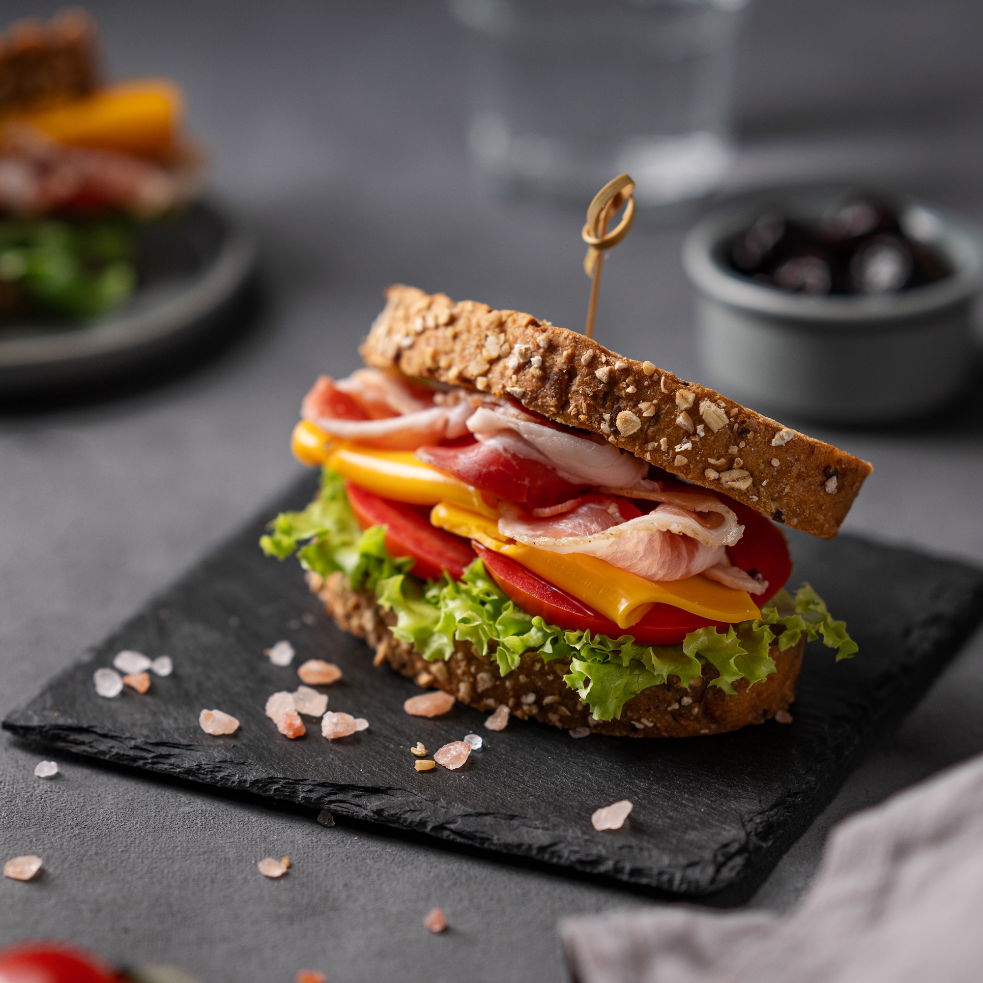 club-sandwich-on-a-board-with-a-bacon-cheese-to-2024-12-06-00-06-58-2