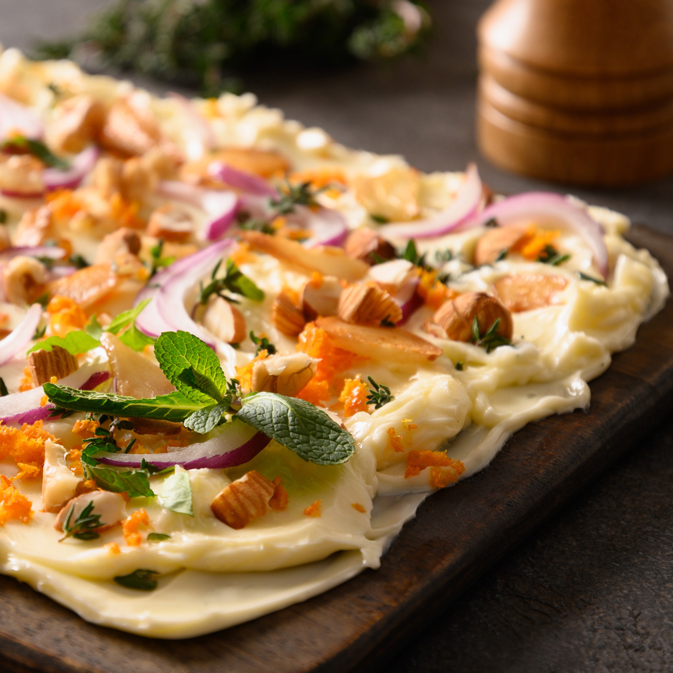 butterboard-with-onion-garlic-orange-herbs-and-2024-07-24-20-01-34-utc-1-1